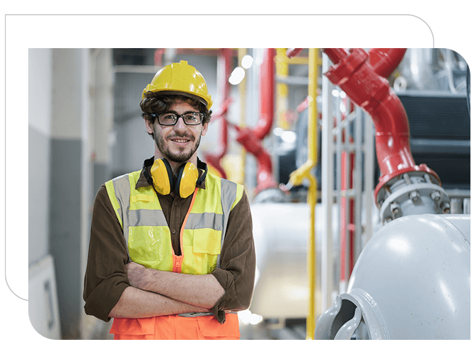 Civil Engineer is standing for the photo in an office