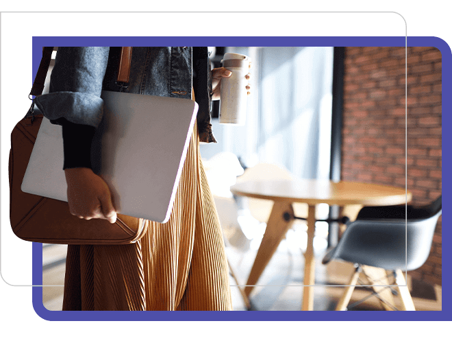 body of woman walking with coffee, bag and laptop