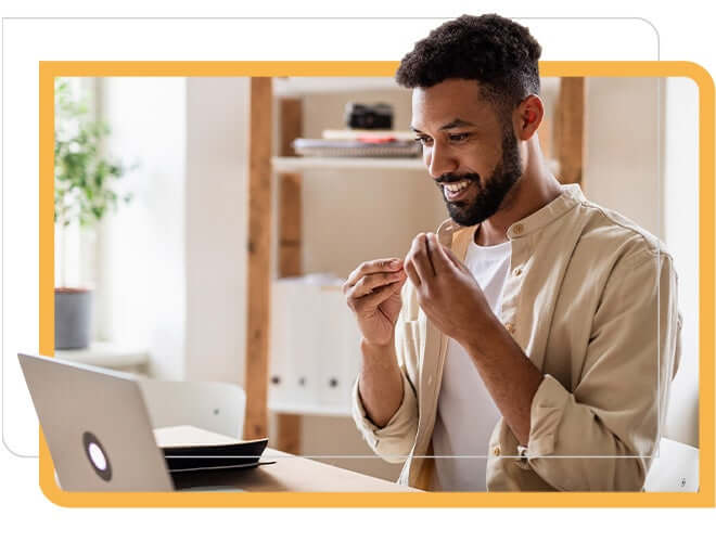 man using sign language to talk to laptop