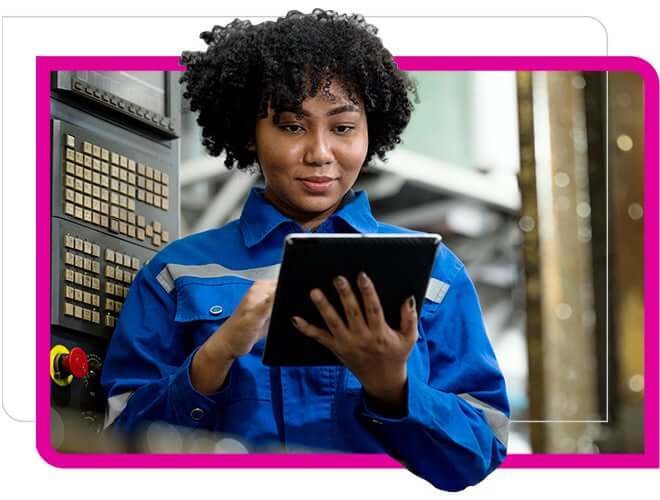 Woman on a tablet in a factory