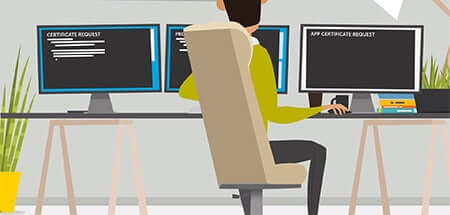 Employee sitting in desk working in desktop