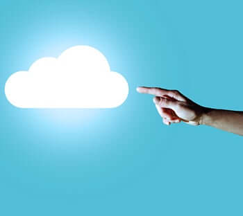 Man finger is pointing to the cloud on blue background.