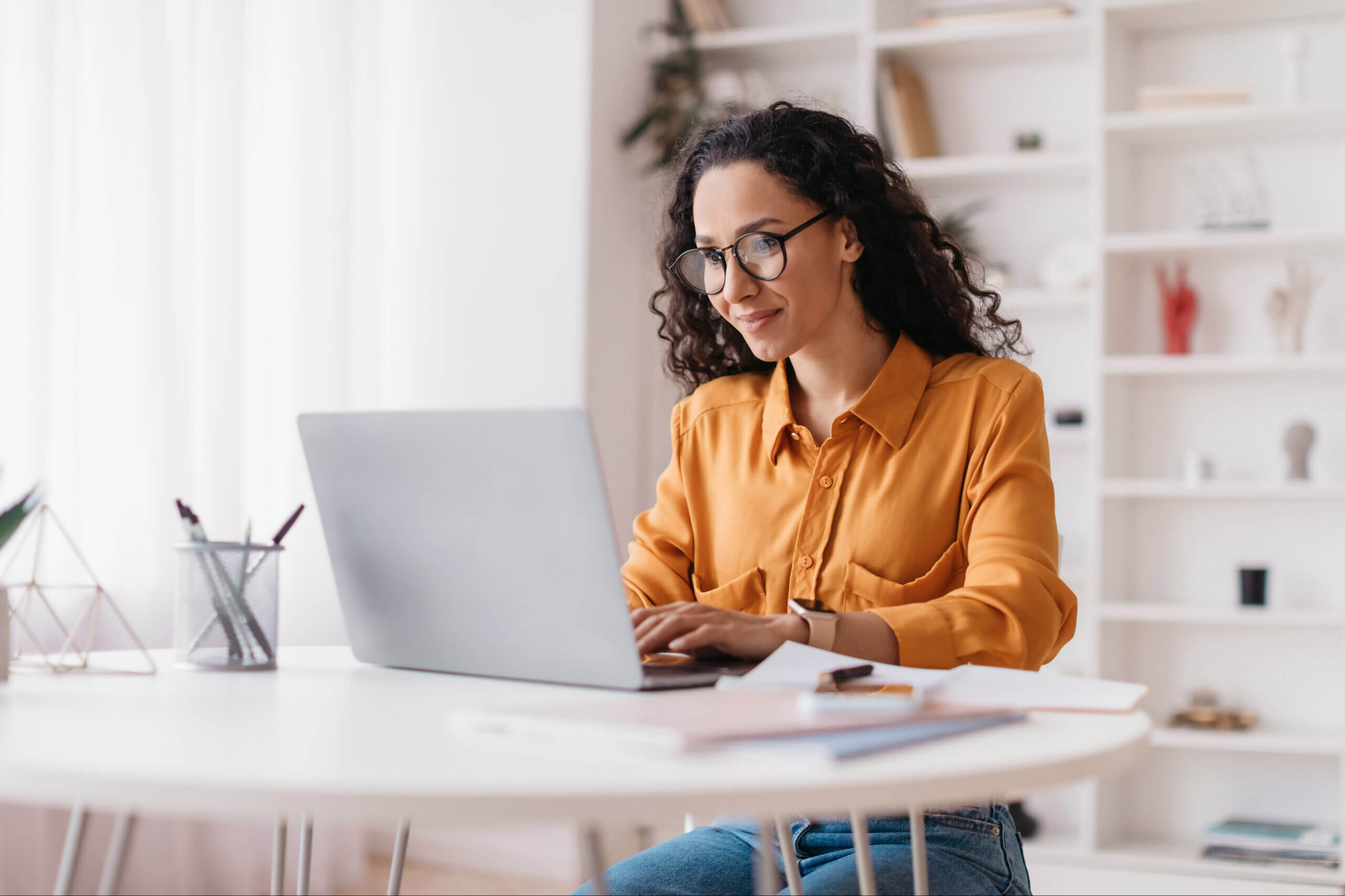 Lady Using Laptop Working Online Sitting In Office