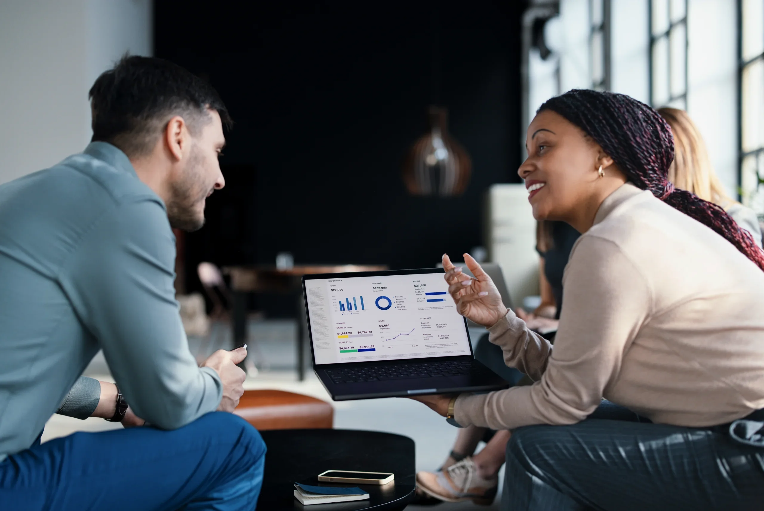Two Office workers on Tablet